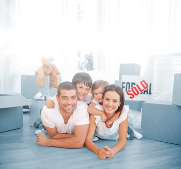 Family in new home to depict Inlanta's Florida Home Loan Solutions new low score program for government-backed mortgages