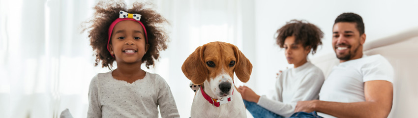 Family with dog wondering about housing affordability to depict Michigan Mortgage lender Inlanta, Grand Rapids, MI